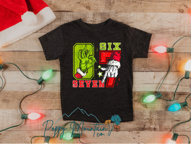 6 7 Green Guy Santa Hands Tee