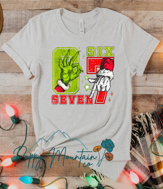 6 7 Green Guy Santa Hands Tee