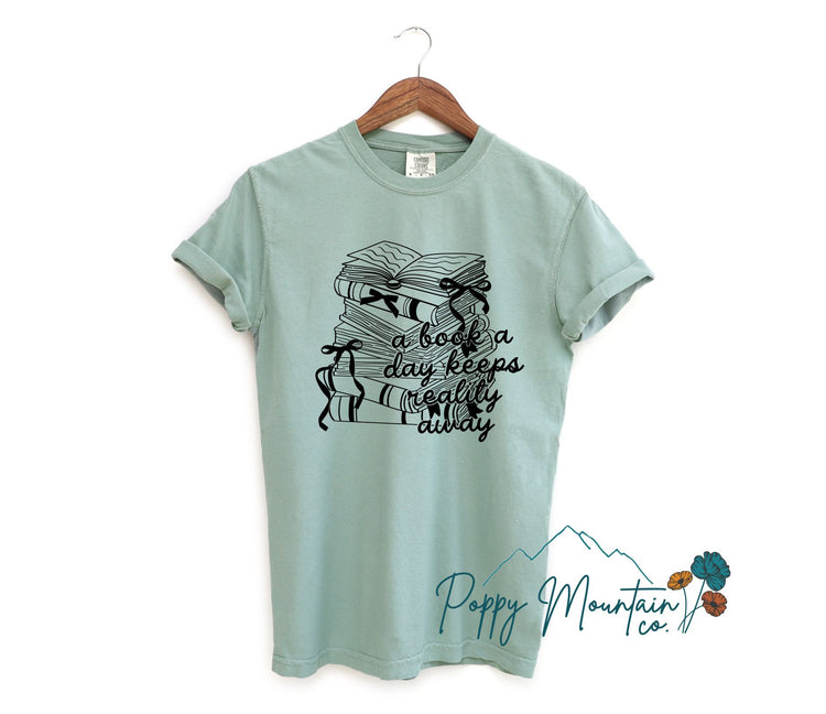 A Book A Day Keeps Reality Away Tee